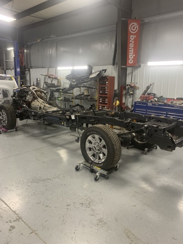 Truck taken down to the bare frame for structural collision repair